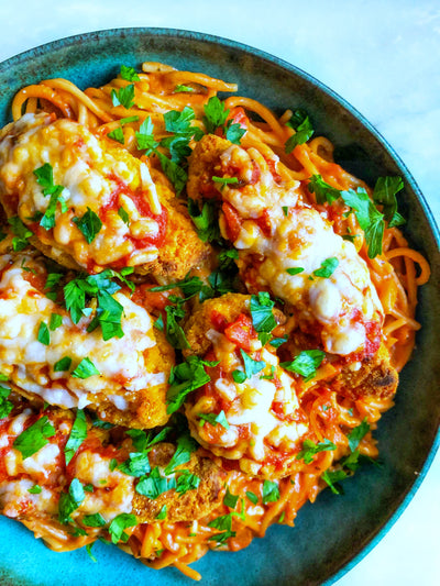 Chicken Parmesan over Spaghetti